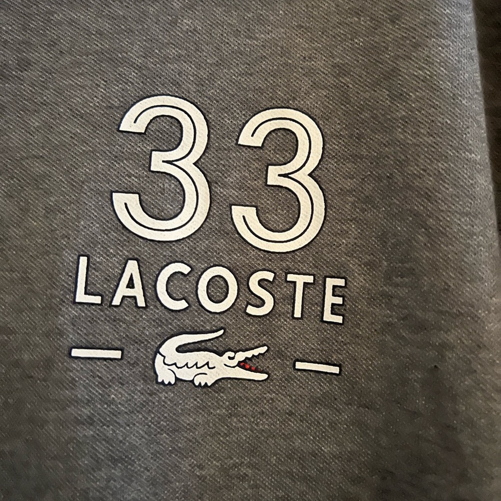 Lacoste Men’s polo shirt charcoal grey with cream writing, sz. 3xl